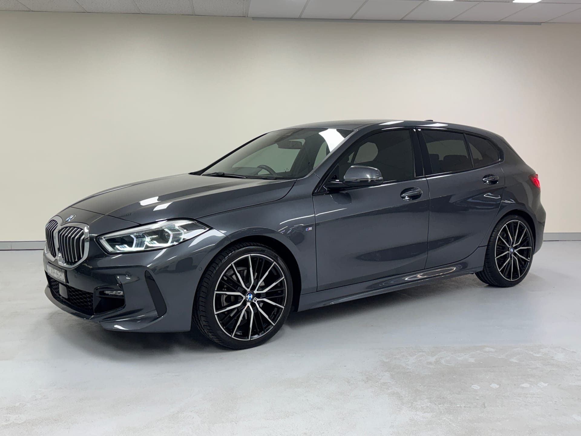 2020 BMW 1 Series 118i M Sport in Mineral Grey — exterior rear