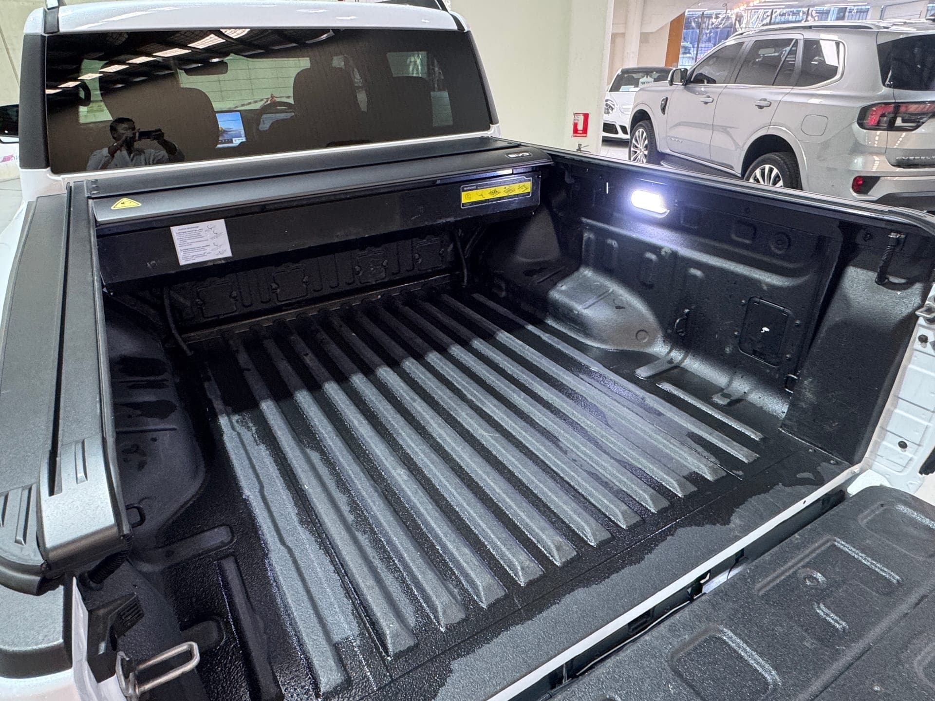 2024 BYD Shark 6 Dual Motor Premium in White — photo 13