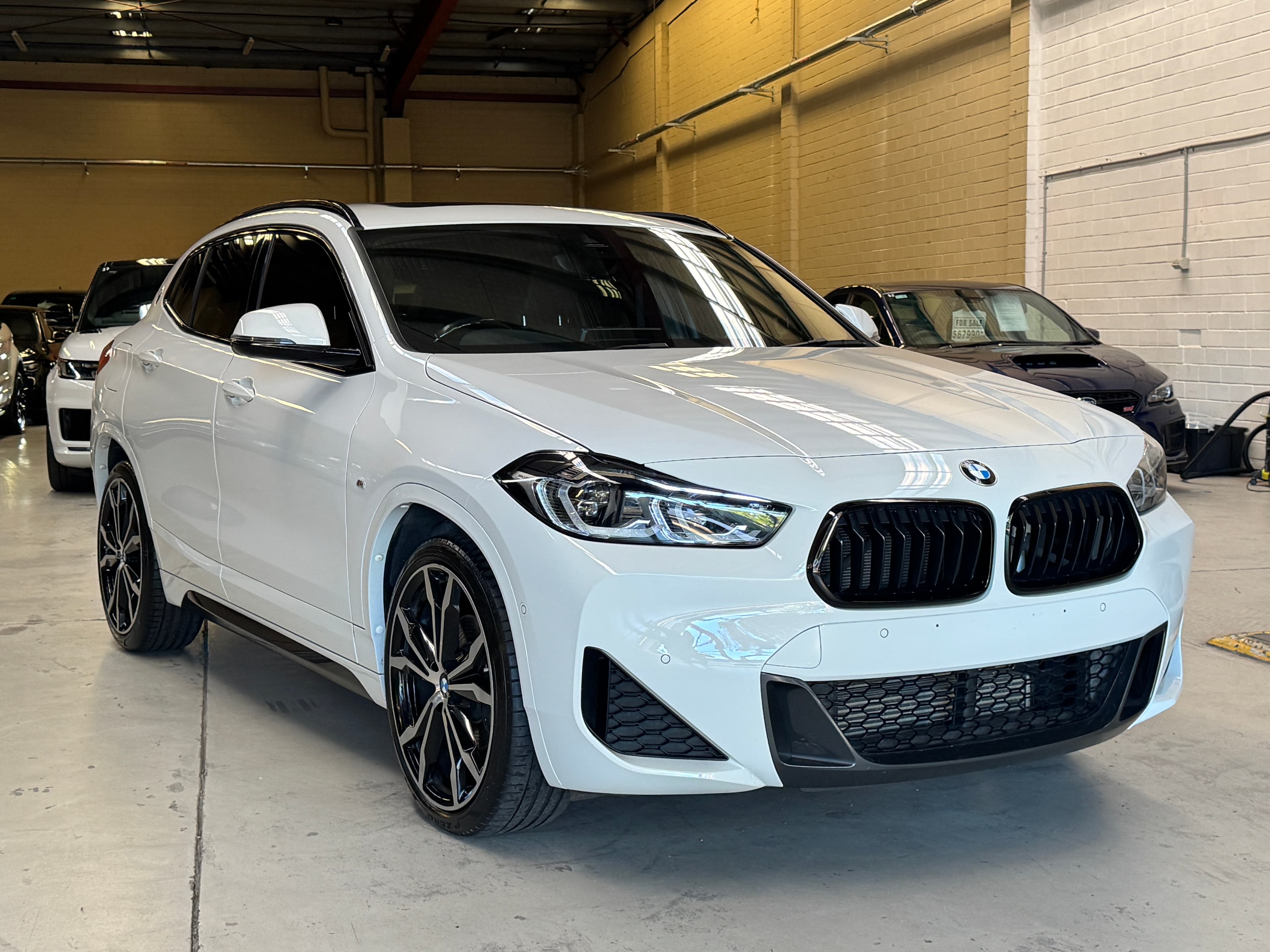 2023 BMW X2 sDrive18i in White — exterior rear