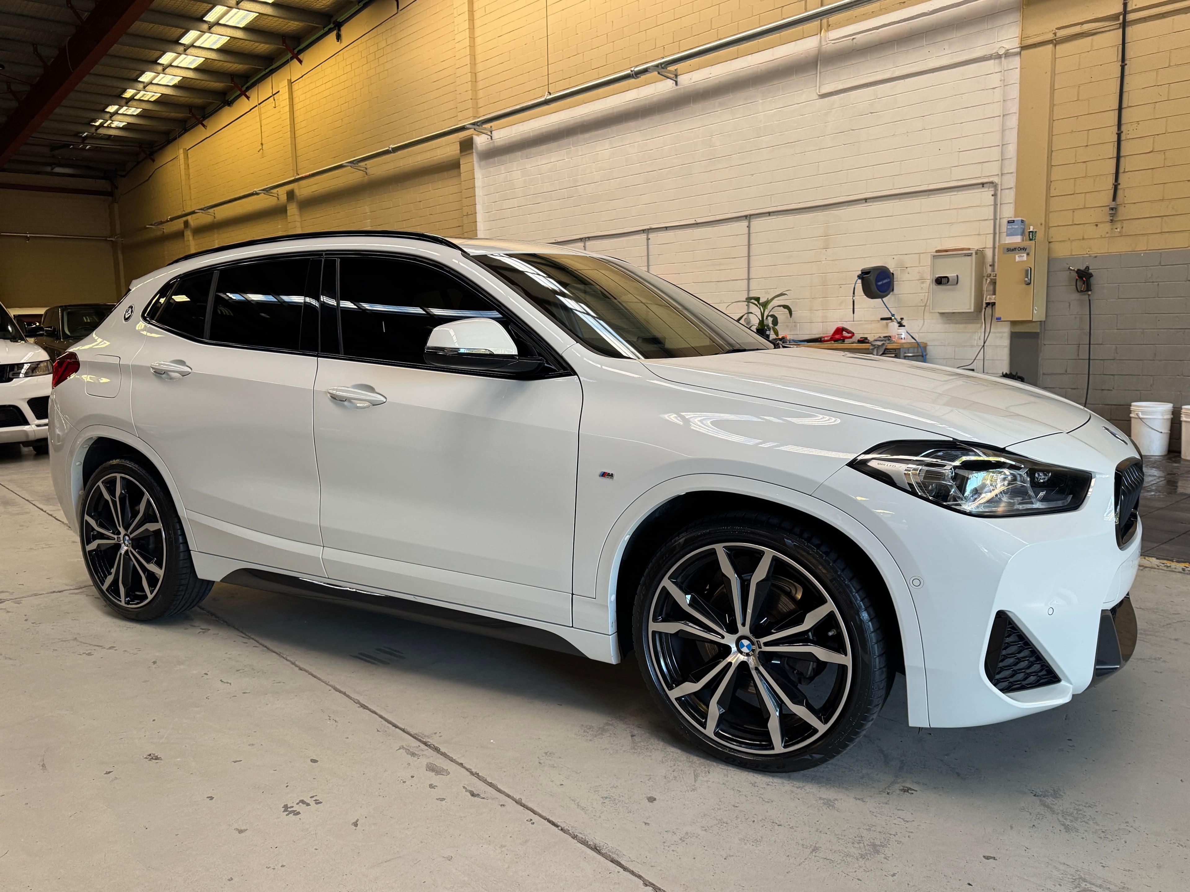 2023 BMW X2 sDrive18i in White — rear seats