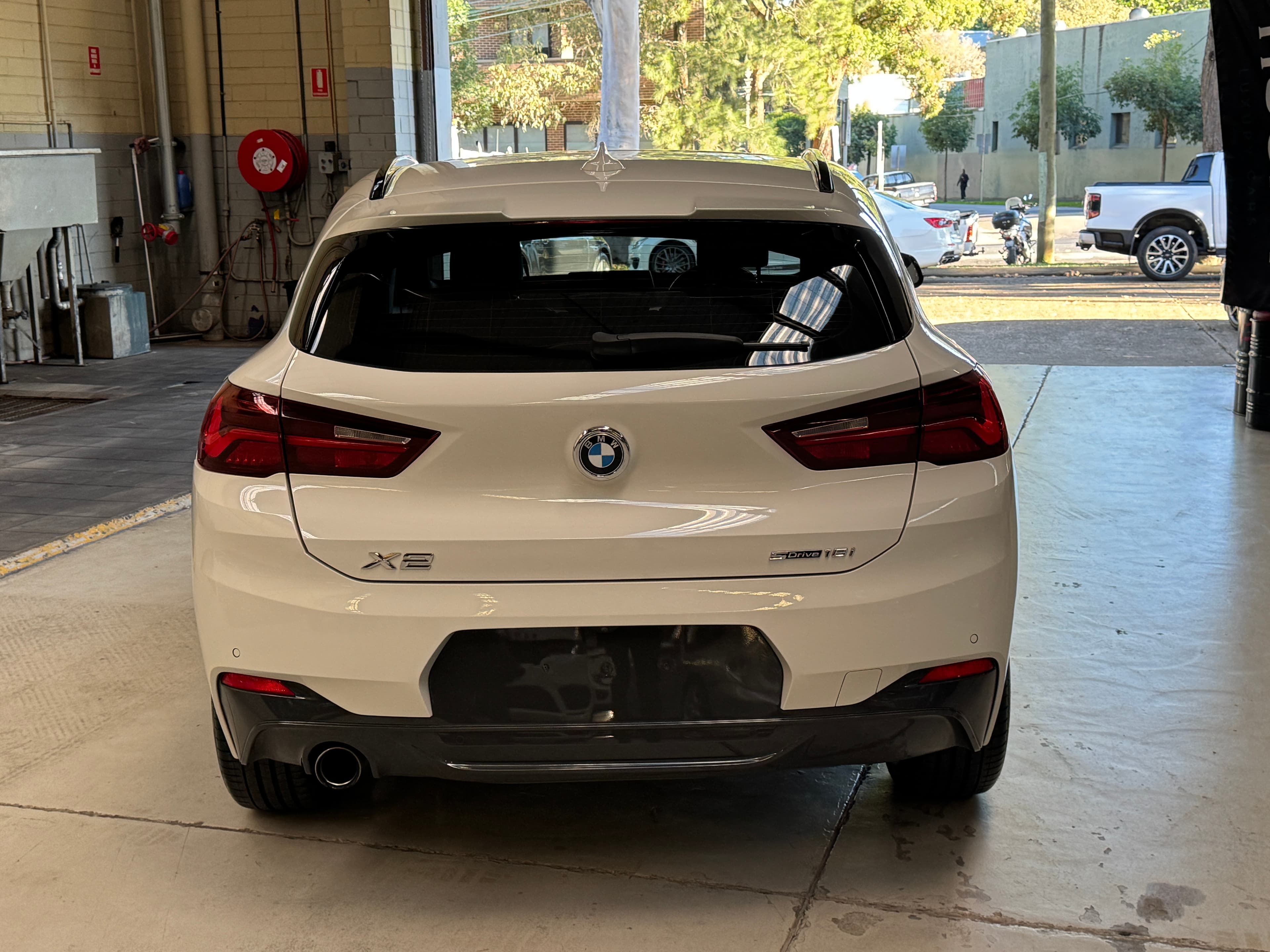 2023 BMW X2 sDrive18i in White — engine bay